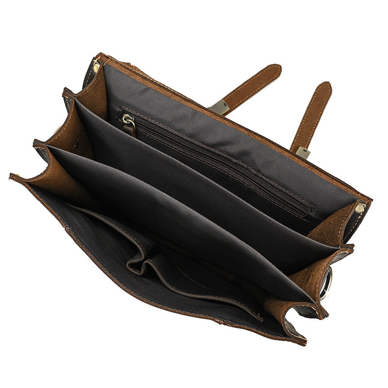 Dark Brown leather bag with open interior on a white background
