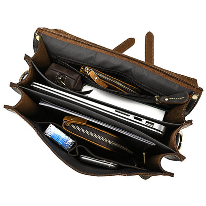 Dark Brown leather briefcase with compartments and items inside on a white background
