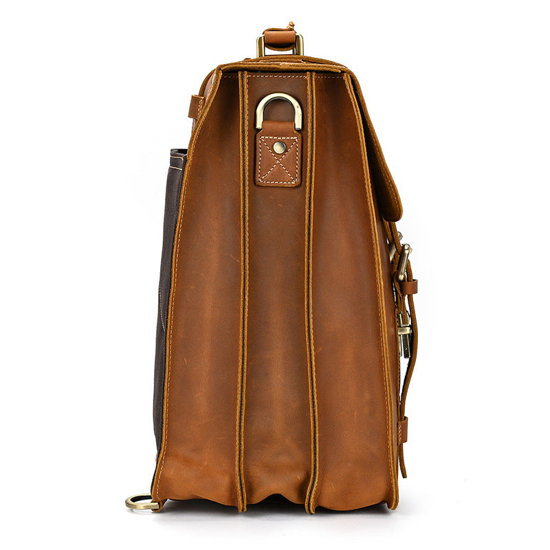 Brown leather backpack on a white background