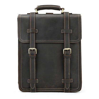 Dark Brown leather briefcase with gold buckles on a white background