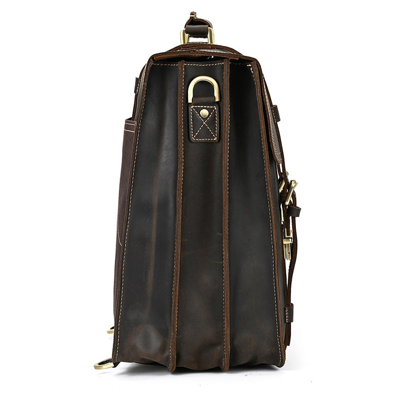 side view of Dark Brown leather backpack with gold accents on a white background