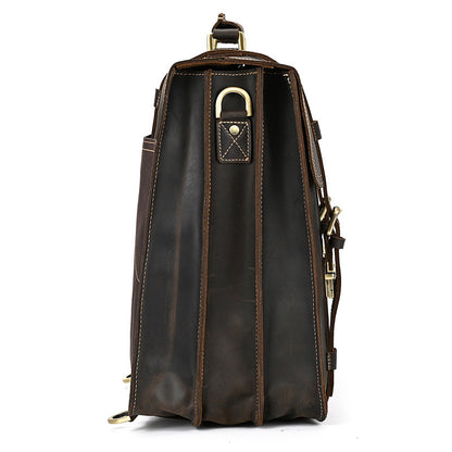 side view of Dark Brown leather backpack with gold accents on a white background