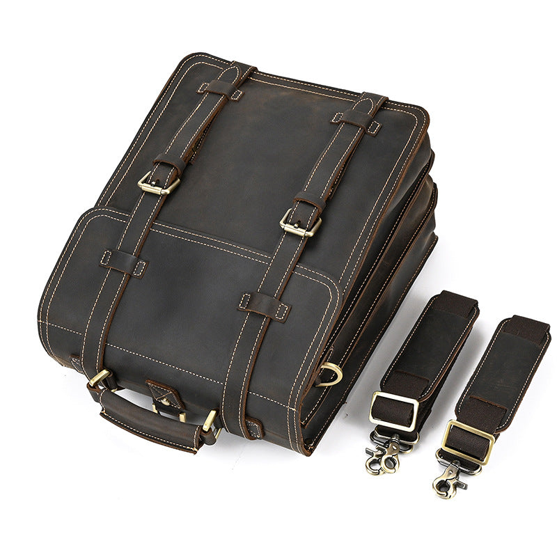 Dark Brown leather bag with straps on a white background