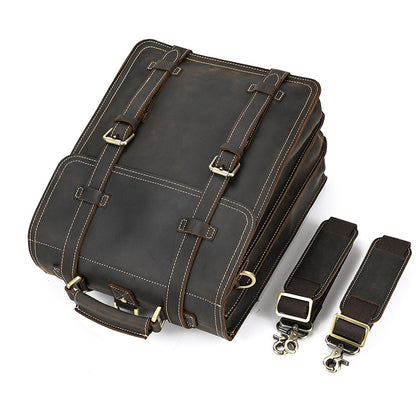Dark Brown leather bag with straps on a white background