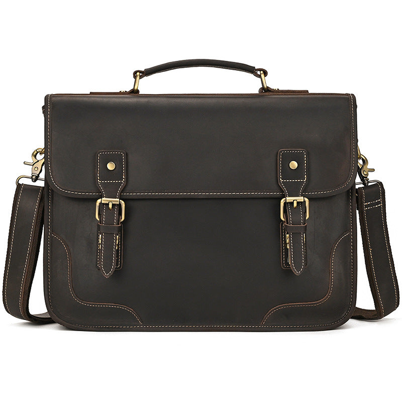 Front view of a Dark Brown Crazy Horse Leather Briefcase with an executive minimal design and decorative buckles.