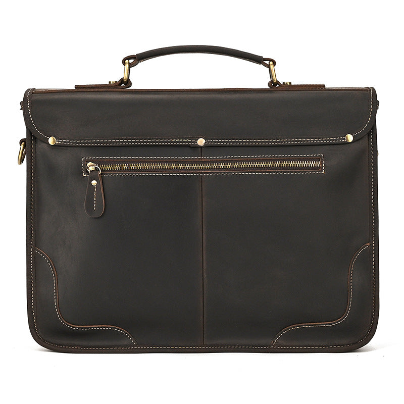 Back view of the Dark Brown leather briefcase showing the clean minimalist stitching and rear zipper pocket.