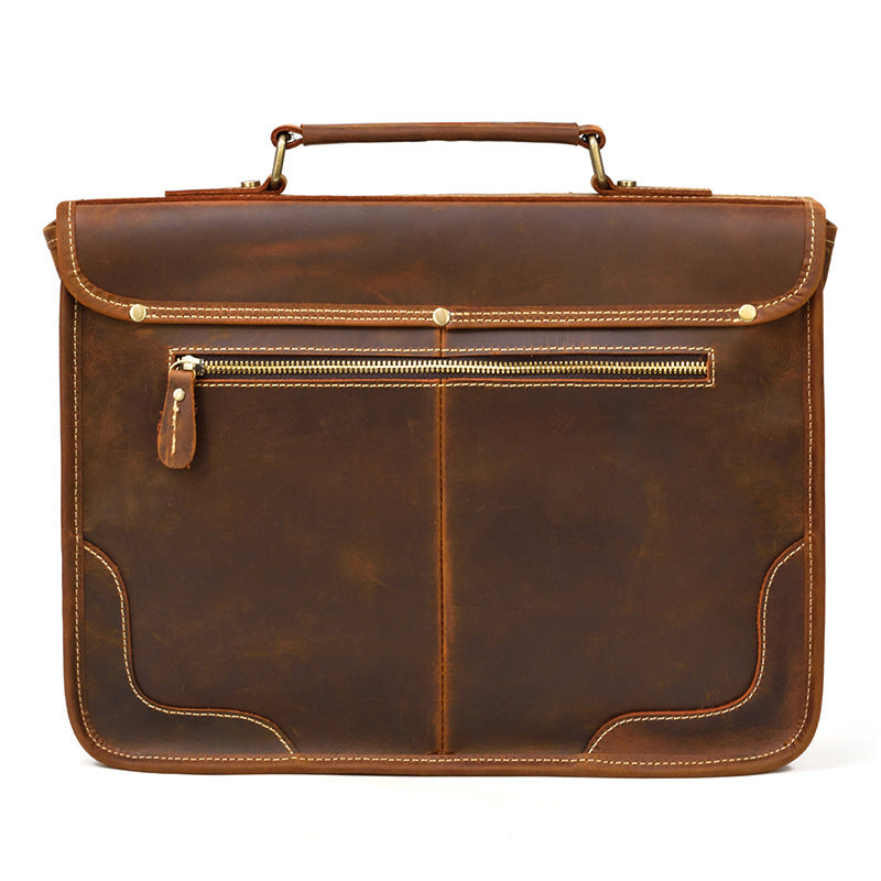 Back view of the Brown leather laptop bag highlighting the spacious rear zipper pocket and slim profile.