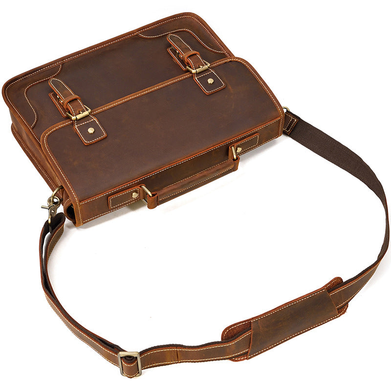 Overhead view of the executive Brown leather briefcase showcasing the rich patina and sturdy leather handles.