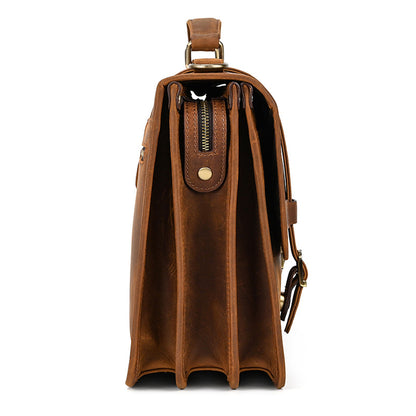 Side profile of triple-compartment light brown leather bag showing spacious gussets.