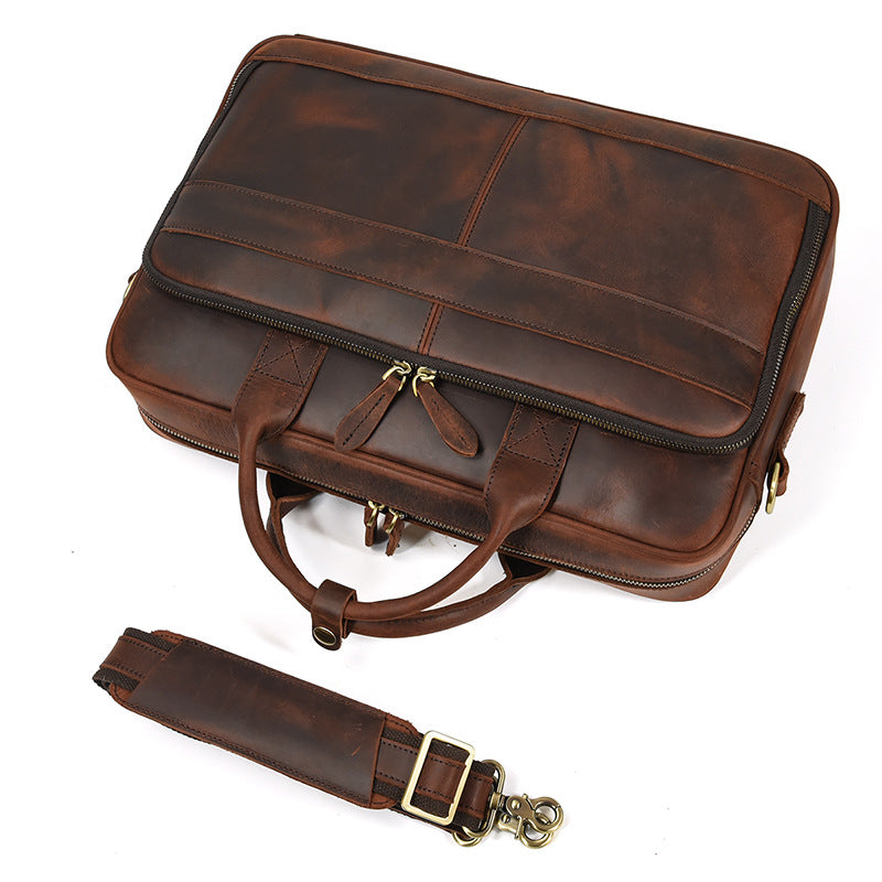 Top view of the Brown Crazy Horse Leather messenger bag with a detachable shoulder strap and metal swivel hooks.