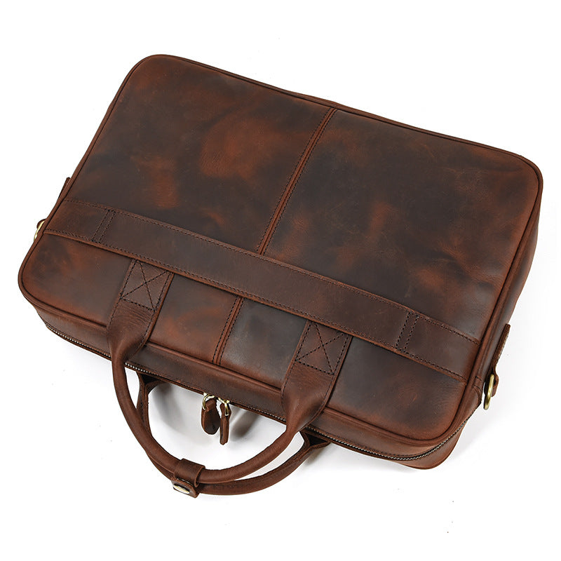 Back view of the Brown vintage leather briefcase showing the clean stitching and smooth full-grain leather texture.
