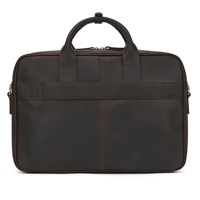 Angled side view of the Dark Brown leather briefcase highlighting the premium full-grain leather texture.