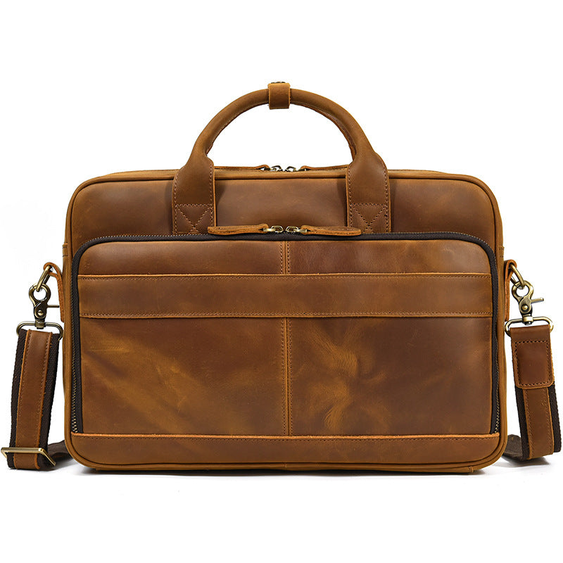 Vintage Light Brown leather laptop bag featuring dual top handles and durable brass hardware.