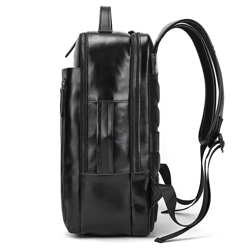 Side view of Classic Black leather backpack on a white background