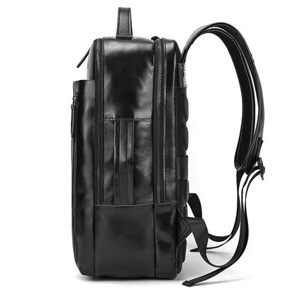 Side view of Classic Black leather backpack on a white background