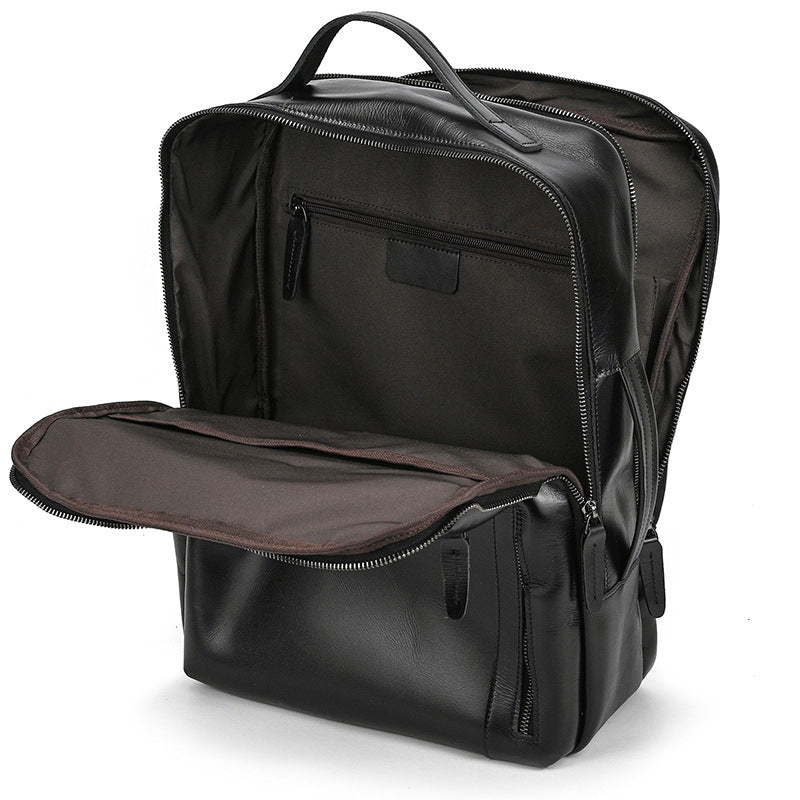 Classic Black backpack with open compartment on a white background