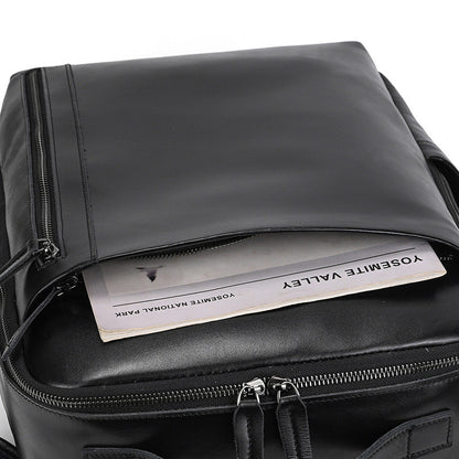 Classic Black backpack with a paper inside, showing the interior space.
