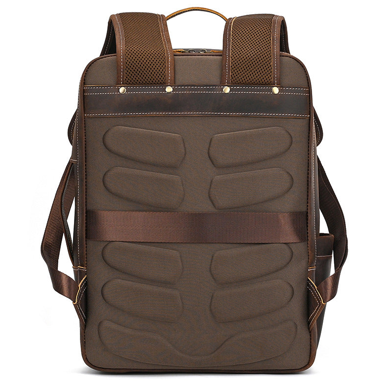 Vintage Brown backpack with textured back panel on a white background