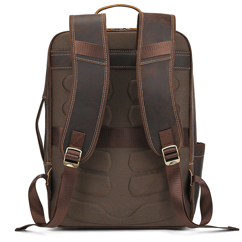 Vintage Brown backpack with leather straps on a white background