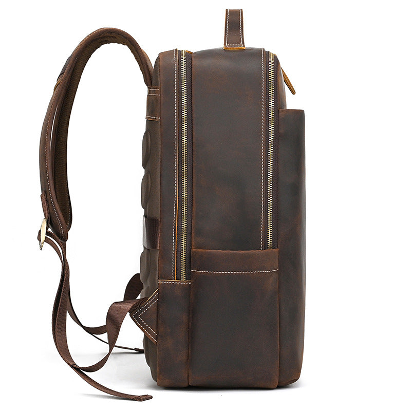 Vintage Brown leather backpack on a white background