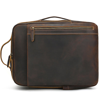 Vintage Brown leather briefcase with gold zipper on a white background
