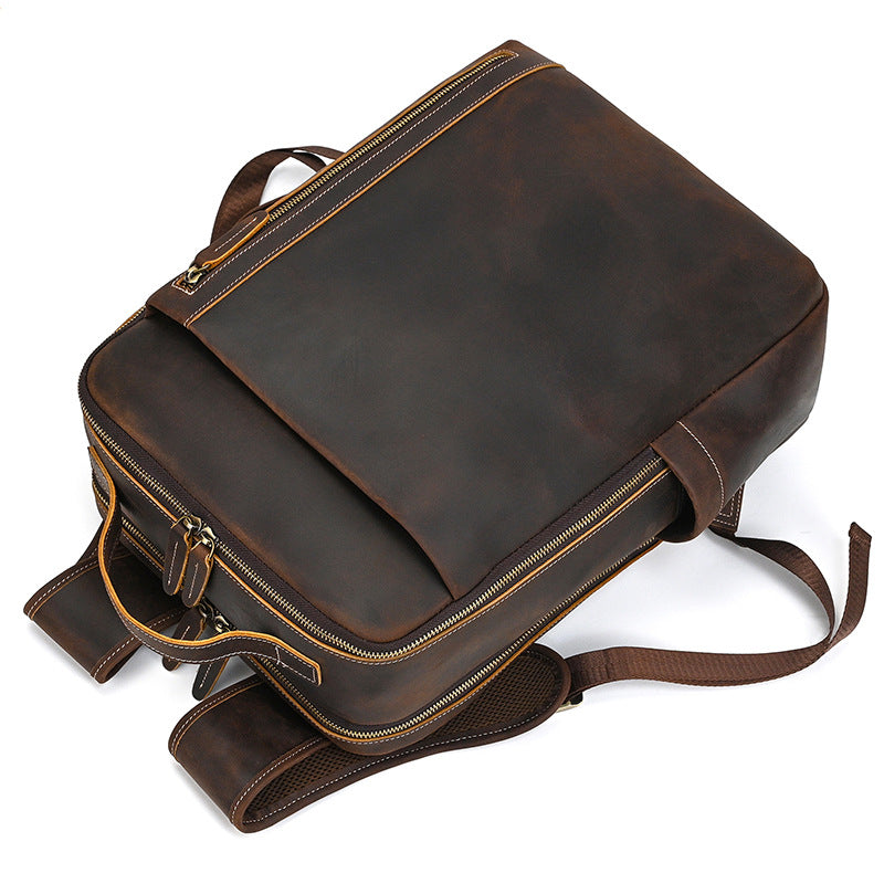Vintage Brown leather backpack on a white background
