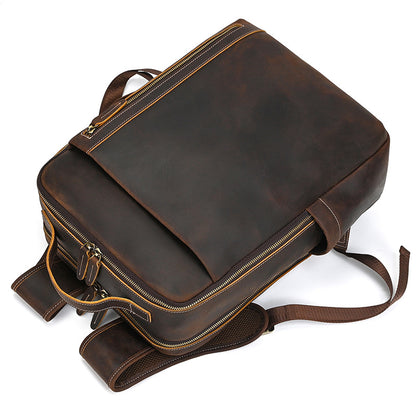 Vintage Brown leather backpack on a white background