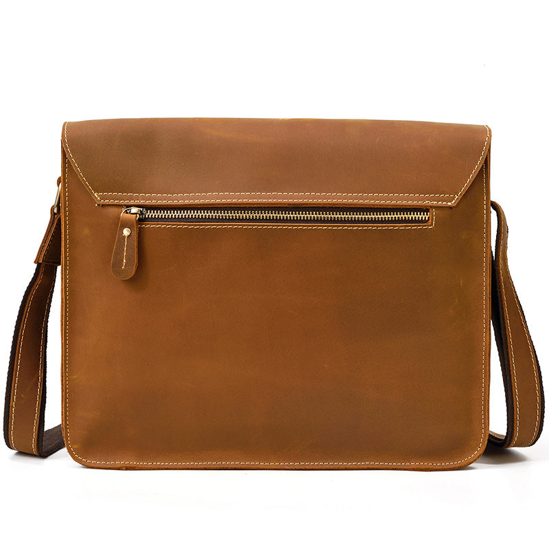 leather messenger bag back view with zipper pocket