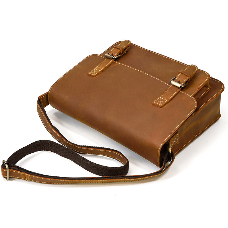 crazy horse leather messenger bag top view showing strap and shape