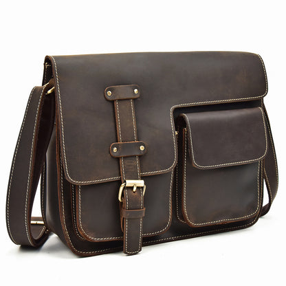 Brown leather satchel bag on a white background