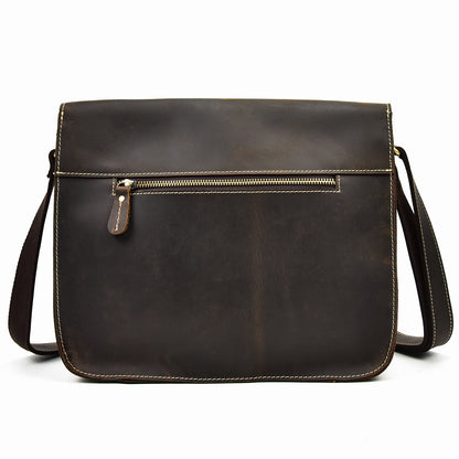 Brown leather shoulder bag on a white background