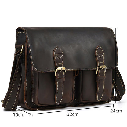 Brown leather satchel bag with measurements on a white background