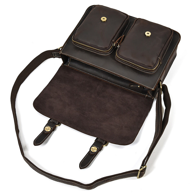 Brown leather backpack with two small pouches on a white background