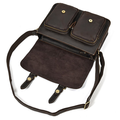 Brown leather backpack with two small pouches on a white background