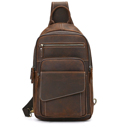 Brown leather sling bag on a white background