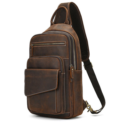Brown leather sling bag on a white background