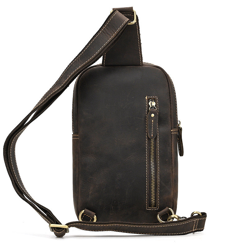 dark brown leather sling bag back view vertical zipper