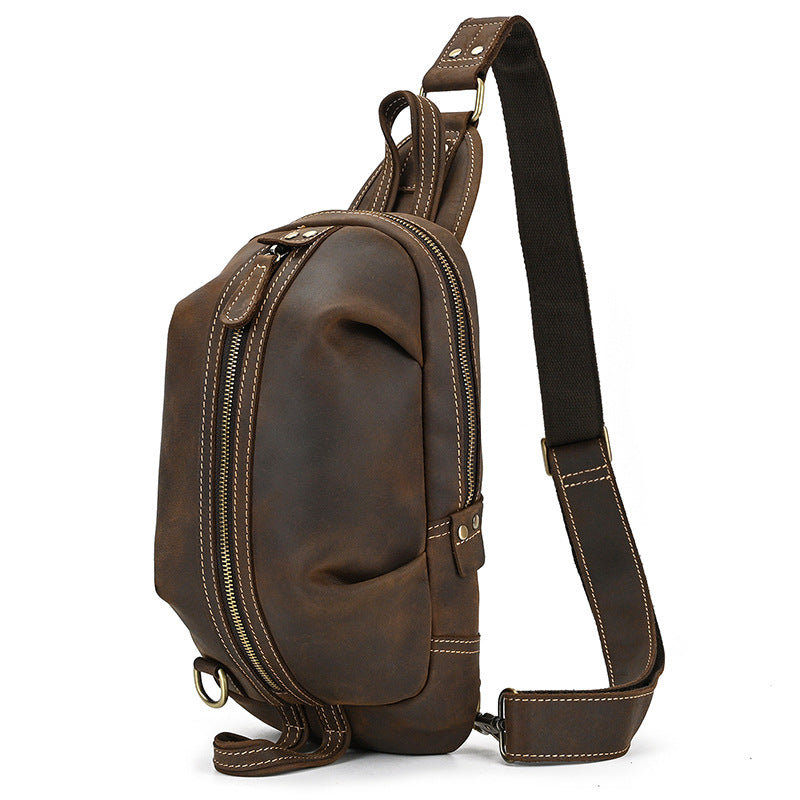 Timber Carry Crazy Horse Leather Sling Bag in dark brown, full side view showing its rugged texture and compact design.