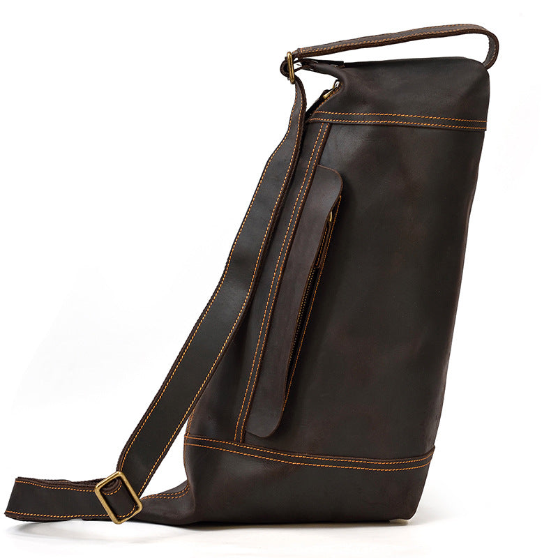 View of the open back pocket of the Crazy Horse Leather Sling Bag, perfect for safe phone or card storage.