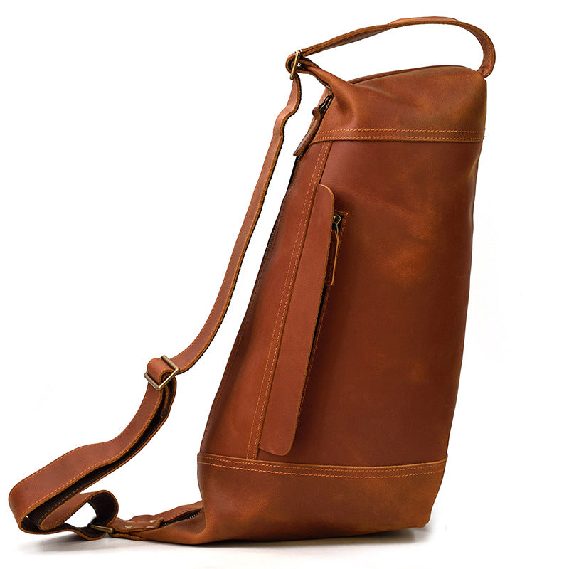 View of the open back pocket of the Crazy Horse Leather light brown Sling Bag, perfect for safe phone or card storage.