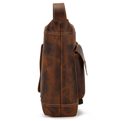 Back view of the Large Capacity Vertical Crossbody Pack, showing the adjustable canvas-reinforced leather strap.
