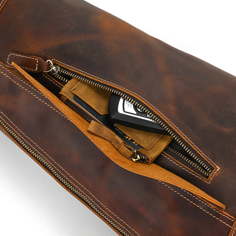 Top-down view of the Crazy Horse Leather Sling Bag, highlighting the main zipper opening and durable stitching.