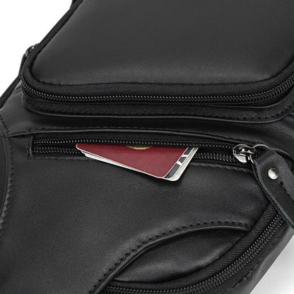 Black leather bag with a red card inside a zipper pocket