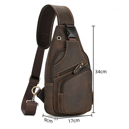 Brown leather sling bag with measurements on a white background