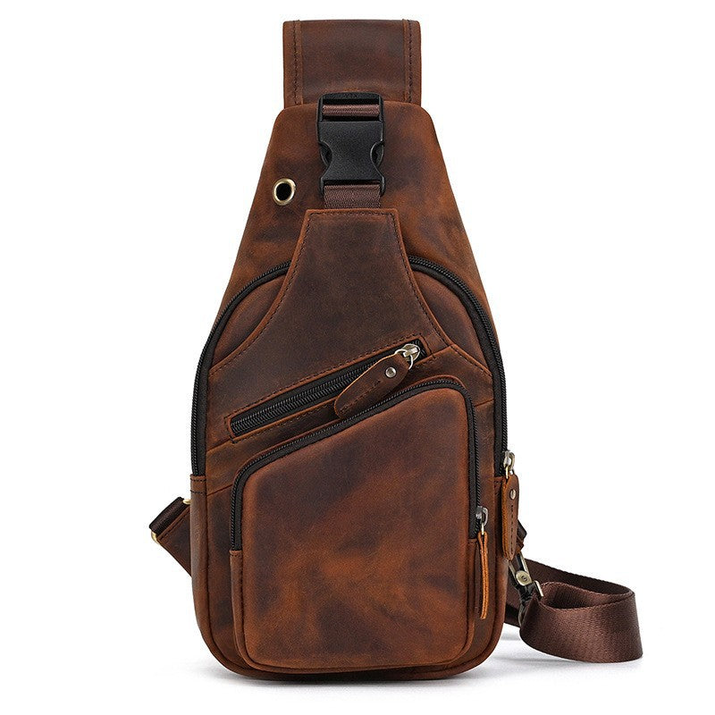 Brown leather sling bag on a white background