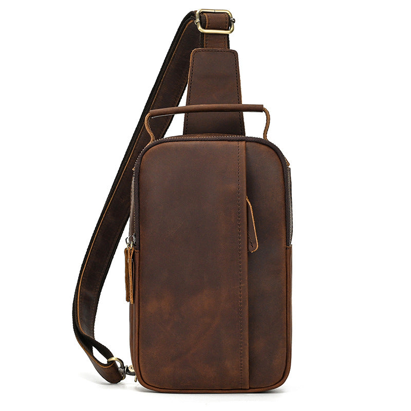 Brown leather sling bag on a white background