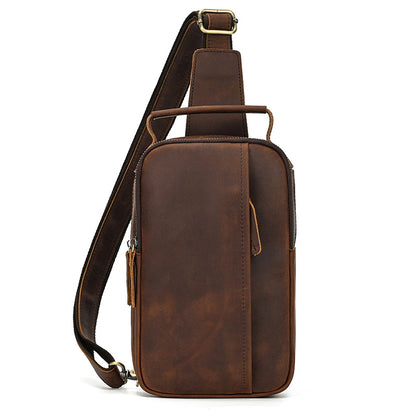 Brown leather sling bag on a white background