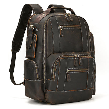 Dark Brown leather backpack with multiple pockets on a white background