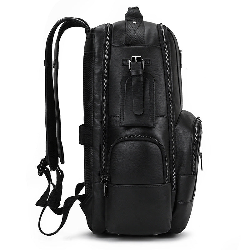 Black leather backpack with multiple zippers on a white background