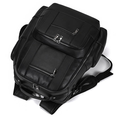 Black backpack with multiple zippers on a white background